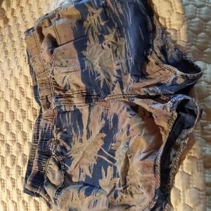 Gap shorts. Palm print. Dolphin Hem.